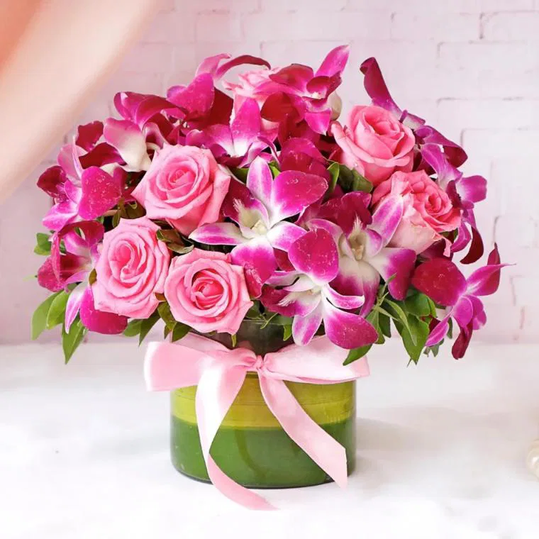 Purple Orchids & Pink Roses In Round Vase