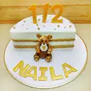 Half birthday cake with teddy bear – image 1